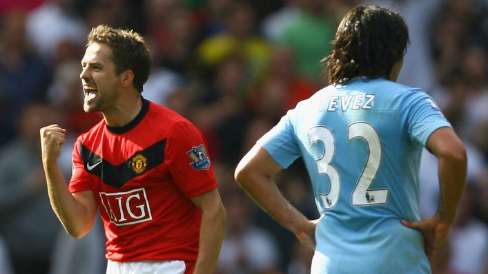 Michael Owen celebrates after scoring the winner in a thrilling seven-goal Manchester derby