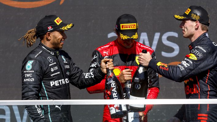Lewis Hamilton, Carlos Sainz and race winner Max Verstappen on the podium in Canada