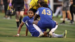 Christopher Nkunku was injured in the first half of Chelsea's draw with Borussia Dortmund
