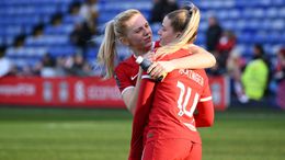 Emma Koivisto congratulates Liverpool goalscorer Marie Hobinger at full-time