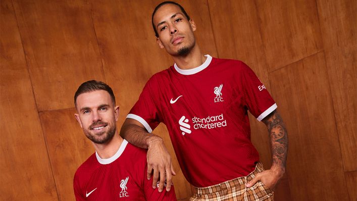 Jordan Henderson and Virgil van Dijk model Liverpool's 2023-24 home shirt