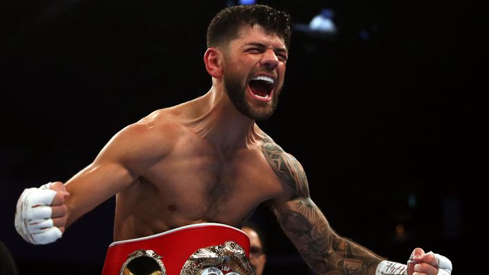 Joe Cordina celebrates after winning the IBF world super-featherweight title