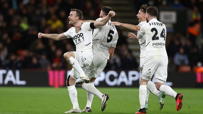 Boreham Wood players celebrate Mark Ricketts' goal against Bournemouth at the Vitality Stadium