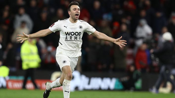 Midfielder Josh Rees celebrates Boreham Wood's shock win at  Bournemouth on Sunday