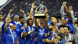 Former West Brom star Matheus Pereira (centre) lifts the AFC Champions League trophy for Al Hilal