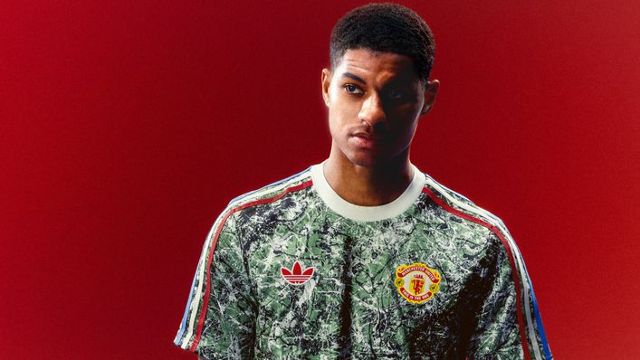 Marcus Rashford models the new Manchester United collection