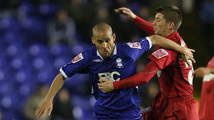 Nigel Quashie (centre) was a tough-tackling midfielder