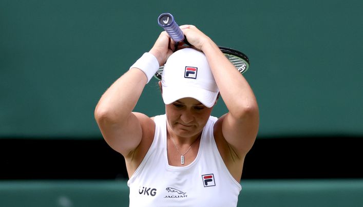 Ash Barty celebrates after beating Angelique Kerber to reach her maiden Wimbledon final