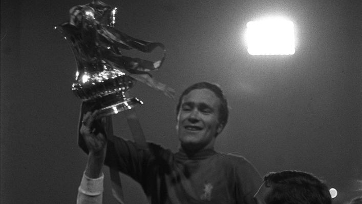 Chelsea captain Ron Harris lifts the FA Cup trophy aloft