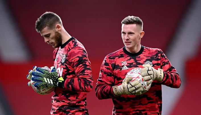 David de Gea (left) finds himself under pressure from Dean Henderson (right)