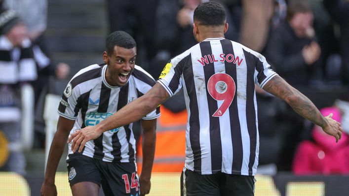 Alexander Isak celebrates with Callum Wilson after scoring against Fulham earlier this season