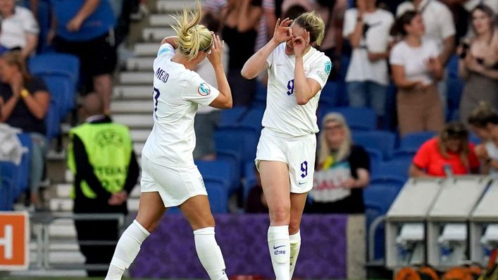 Beth Mead celebrates with Ellen White after England's No9 added the sixth before half-time