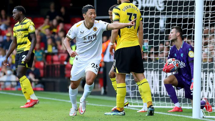 Hwang Hee-chan celebrates after doubling Wolves' advantage