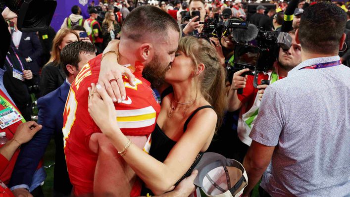 Travis Kelce and Taylor Swift embraced after Kansas City Chiefs won the Super Bowl