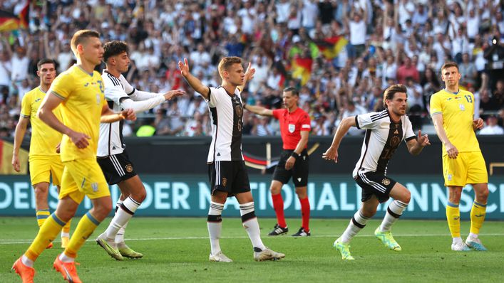 Joshua Kimmich's stoppage-time penalty earned Germany a 3-3 draw with Ukraine