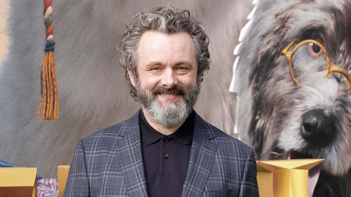 Michael Sheen has been invited to the World Cup by Wales boss Robert Page