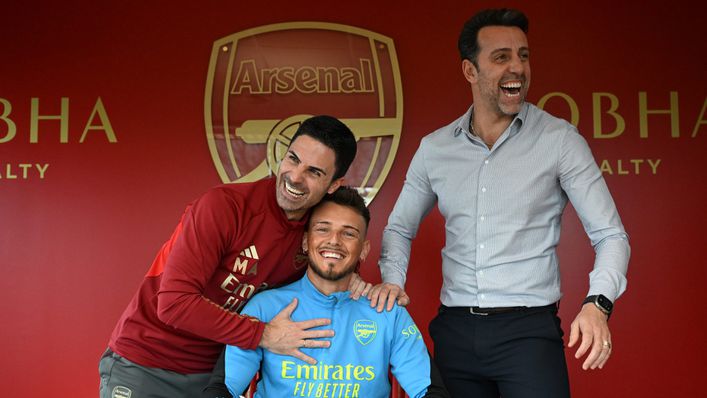 Mikel Arteta and Edu share a joke with Ben White at his contract signing