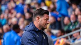Johnnie Jackson's Wimbledon are just one game away from the League Two play-off final