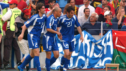 Georgios Karagounis celebrates scoring Greece's opener against Portugal after just six minutes of the tournament's curtain-raiser in 2004