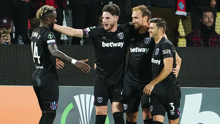 West Ham players embrace Craig Dawson after his first-half header