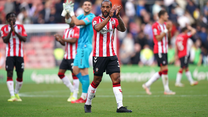 Theo Walcott applauds the fans following Saints' victory over Leeds
