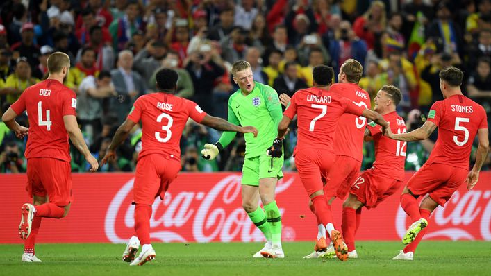 England players celebrate their penalty shootout victory over Colombia