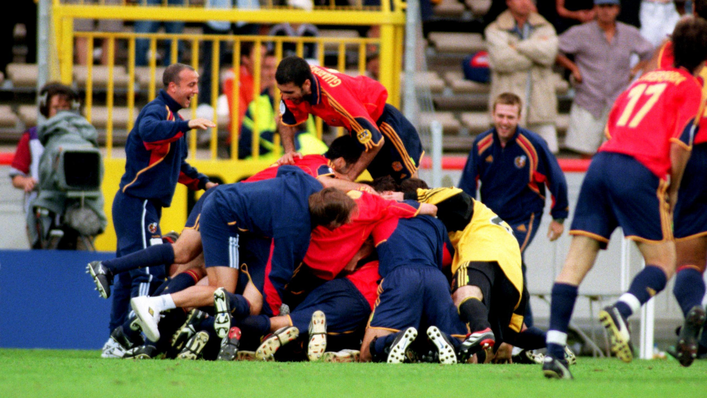 Spain celebrate Alfonso Perez's dramatic late winner against Yugoslavia with a pile-on