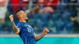 Slovakia skipper Marek Hamsik celebrates his country's win over Poland on matchday one