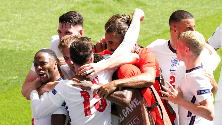 England players celebrate Raheem Sterling's winning goal against Croatia on matchday one