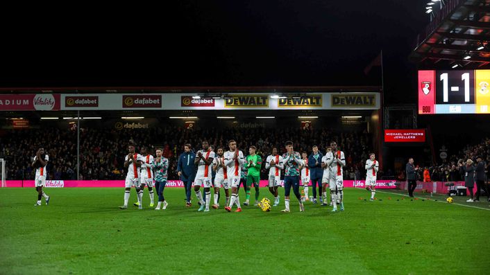 Luton players applauded both sets of fans after the game was abandoned