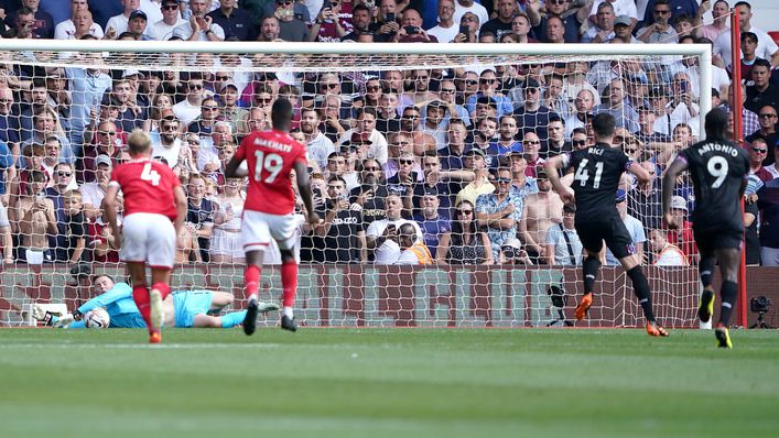 Dean Henderson dives to his right to keep out Declan Rice's penalty against West Ham