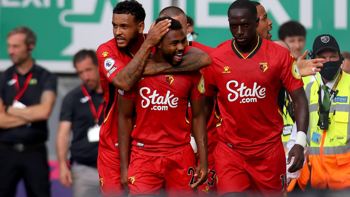 Emmanuel Dennis is congratulated by his teammates following his goal against Norwich