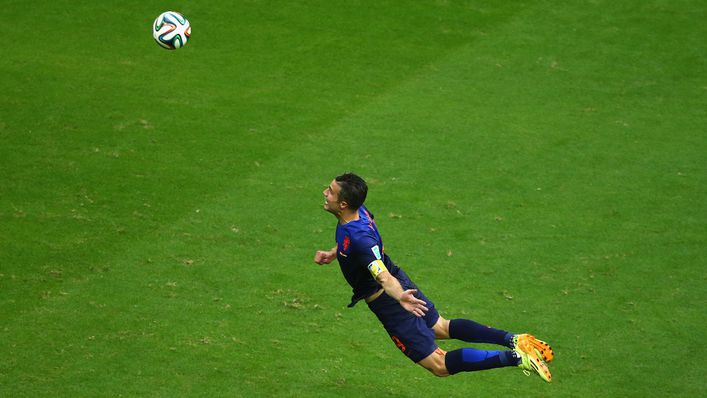 Robin van Persie scoring a diving header for the Netherlands against Spain at the 2014 World Cup