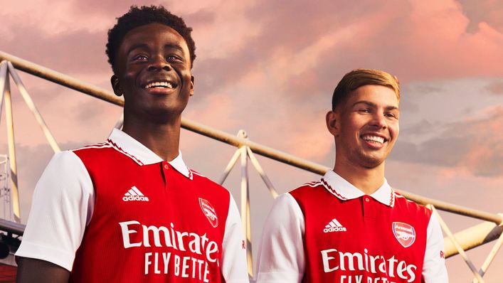 Arsenal stars Bukayo Saka and Emile Smith Rowe show off the club's new collared home shirt