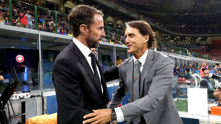Italy head coach Roberto Mancini (R) with Gareth Southgate