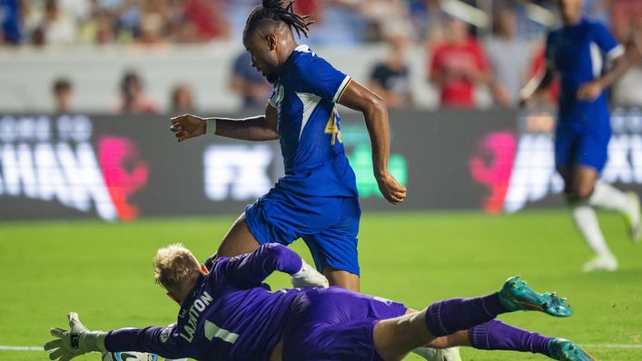 Christopher Nkunku rounded Rob Lainton to roll home his first goal for Chelsea