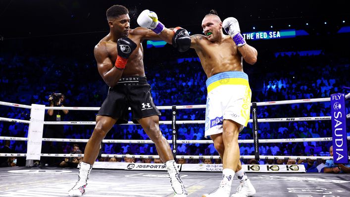 Anthony Joshua and Oleksandr Usyk fire off shots in the middle of the ring