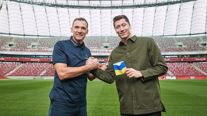Laureus ambassador Andriy Shevchenko has presented Poland captain Robert Lewandowski with a blue and yellow armband