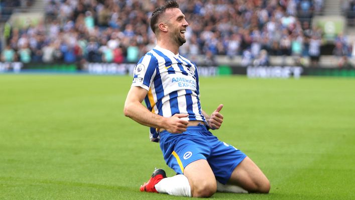 Shane Duffy slides away in celebration after his opening goal