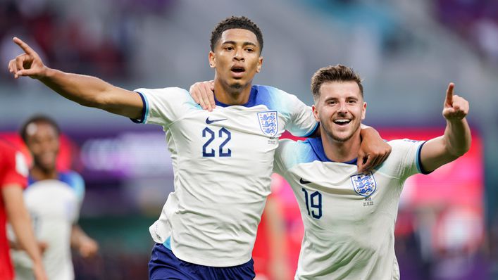 Jude Bellingham celebrates his goal with England team-mate Mason Mount