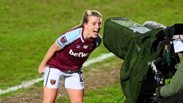 Kate Longhurst yells 'have some of that' into the TV camera after scoring a last-minute equaliser against Tottenham