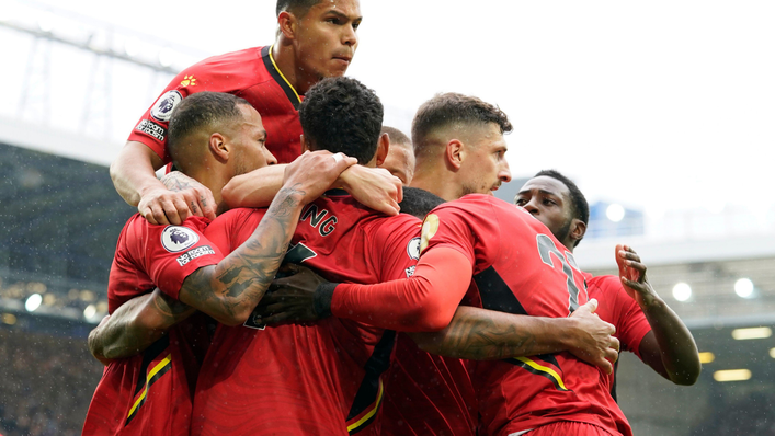 The Watford players celebrate after a Josh King goal