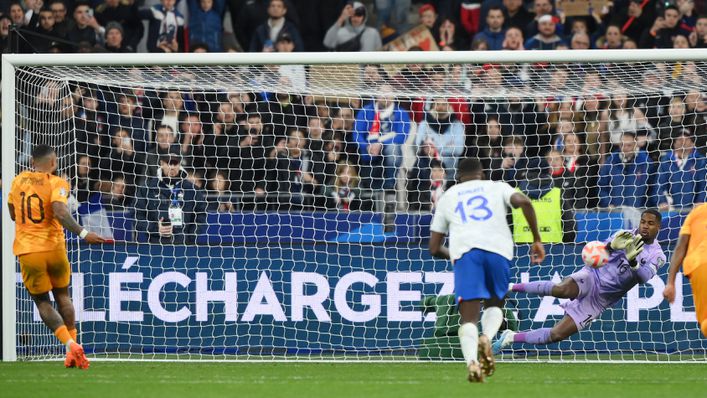 Mike Maignan saved Memphis Depay's penalty in the dying minutes of the game