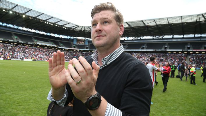 Karl Robinson guided MK Dons to the Championship in 2015