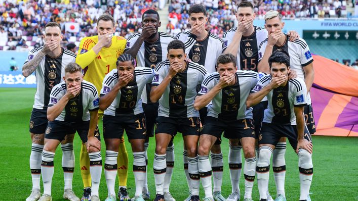 Germany covered their mouths for their team photo in a show of defiance to FIFA