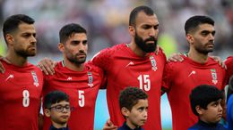 Iranian players stood in silence during their national anthem before their match against England