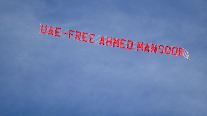 A banner calling for the release of activist Ahmed Mansoor was flown over the Etihad