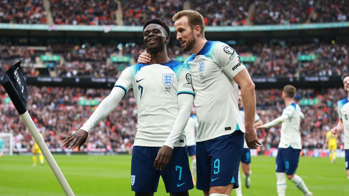 Bukayo Saka and Harry Kane celebrate England's second goal