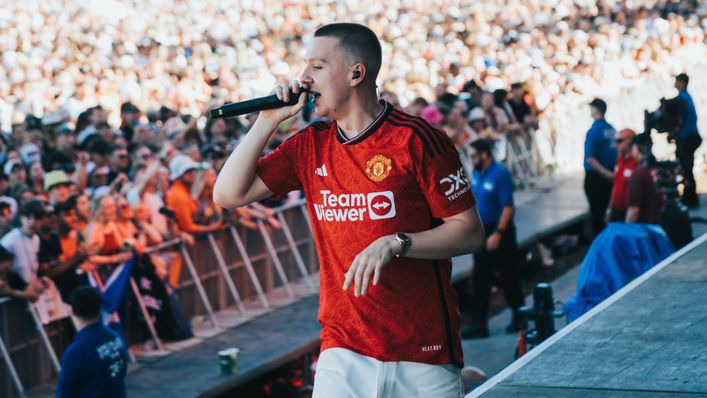 Rapper Aitch caused a shock when he emerged for his set at Glastonbury in the new Manchester United kit