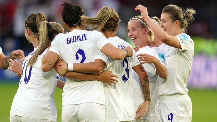 Goalscorer Beth Mead is mobbed by her fellow Lionesses